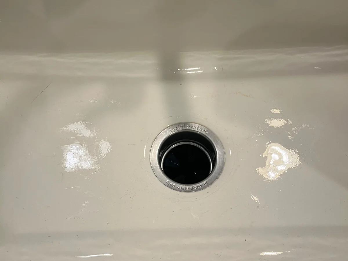 Gleaming white sink after cleaning